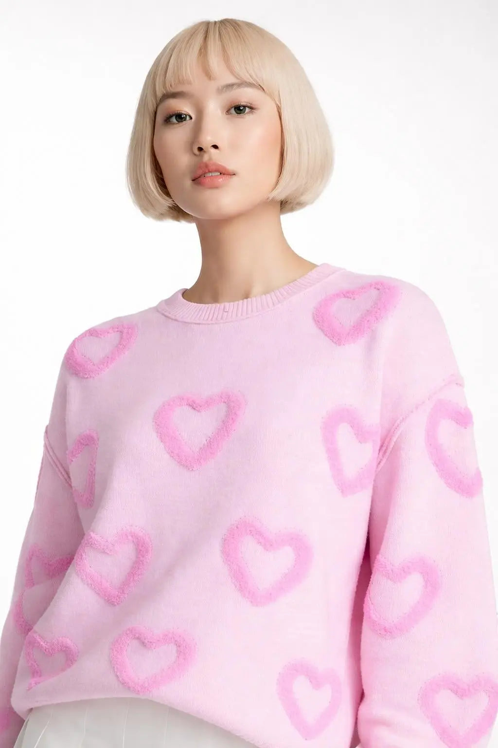 Close-up of the model wearing Heart Shape Bubble Sleeve Baggy Sweater