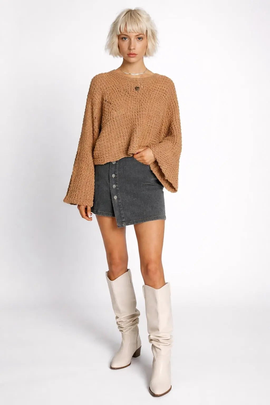 Full body view of the model wearing Hollowed Detail Wide Sleeve Loose Pullover Sweater