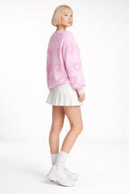 Side profile of the model wearing Heart Shape Bubble Sleeve Baggy Sweater