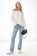 Full body view of the model wearing One Shoulder Ribbed Knit Sweater